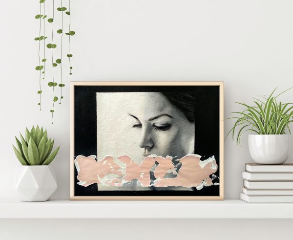 "Black and white serie 6" modern portrait with pink textured line with gold metal frame standing on the table with plants in pots and pile of books on empty white wall background