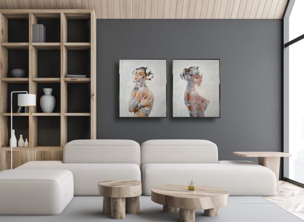 two neophotorealism artworks displayed in Interior of attic living room and home library with gray walls, comfortable white sofa standing near crude coffee tables and bookcase with vases.