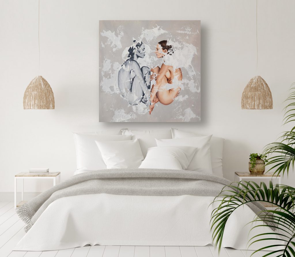 white walls bedroom with bed two lamps and flowers and an original figurative artwork hanging on the wall