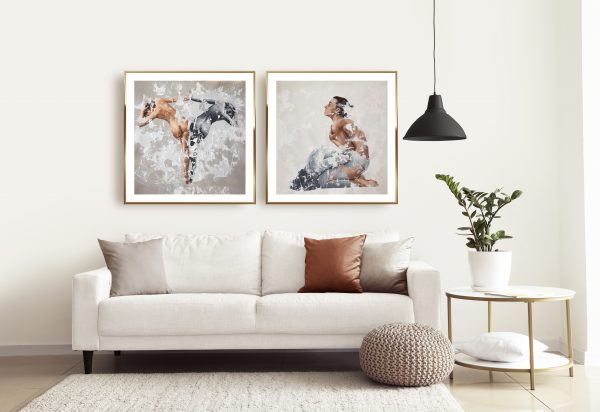 two Raúl Lara neophotorealism figurative signed edition art prints of "Statera" and "Orationis" framed in Interior of modern room with comfortable sofa